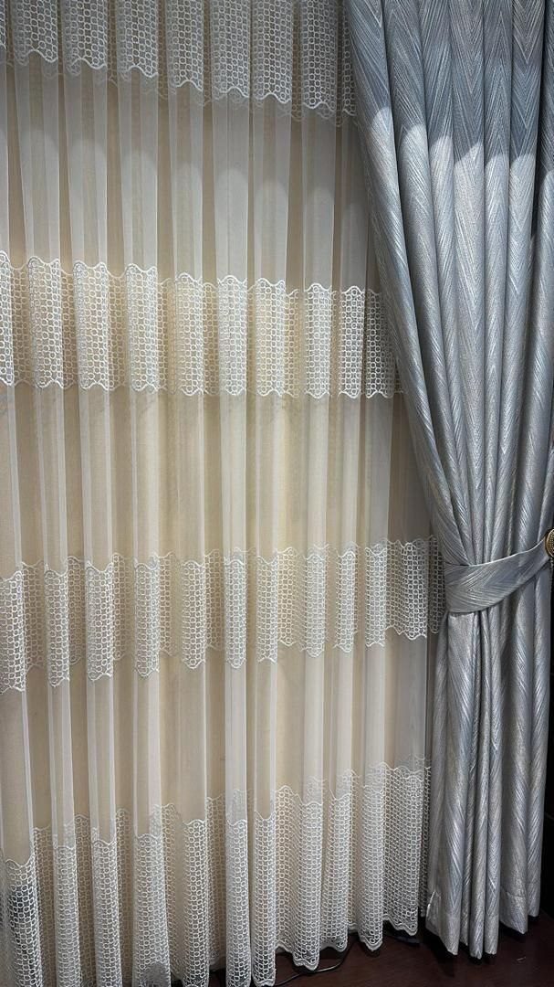 Curtain fabric detail, lace trim