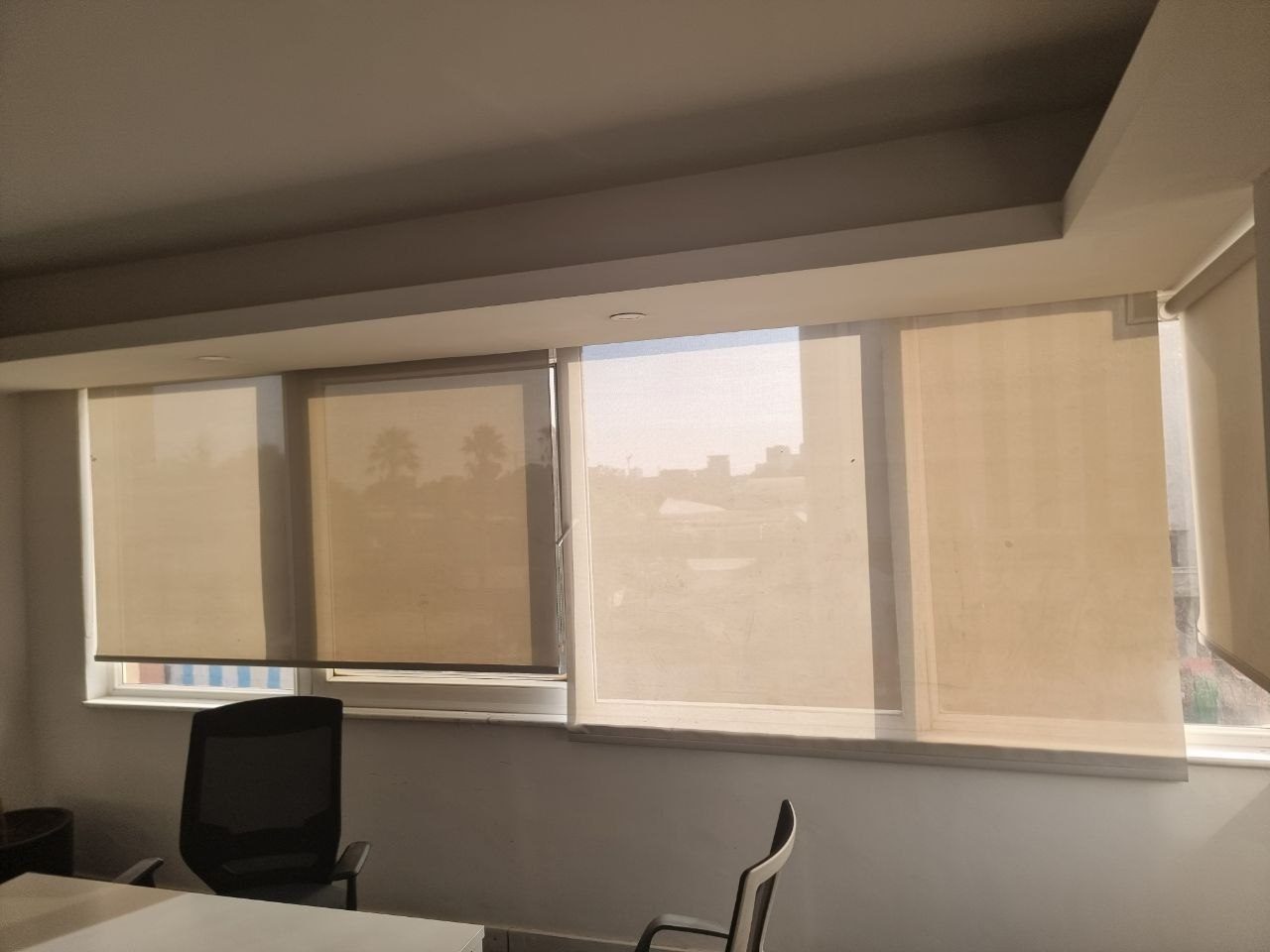 Roller blind installation, city view
